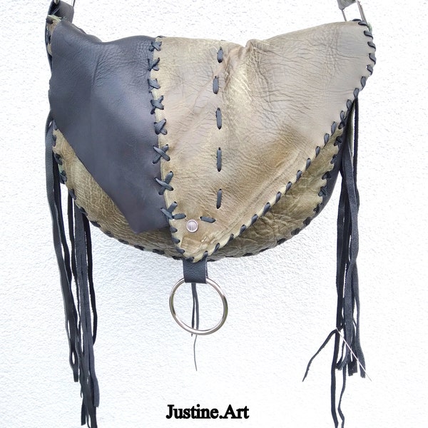 Leather handbag with fringes