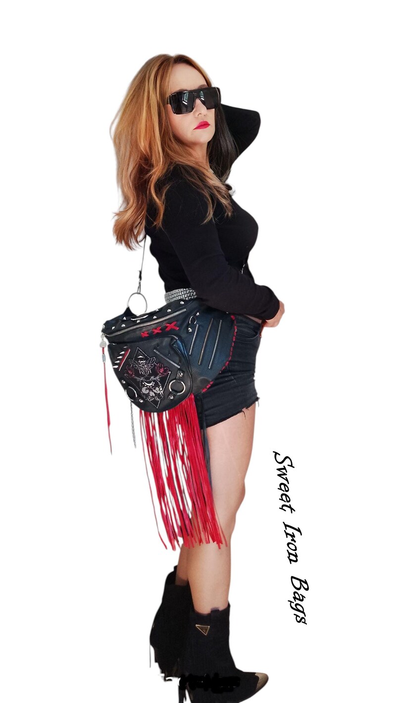 Handmade gothic leather handbag in black and red with skull patch and silver chain