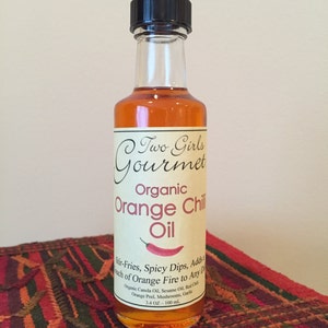 Orange Chili Oil - Organic canola oil infused with chilies and orange zest