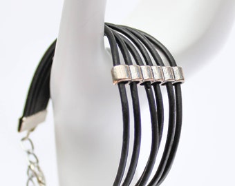 Black leather bracelet with silver connector
