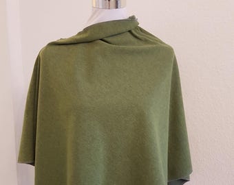 Poncho made of winter sweat in green plain
