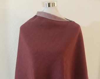 Poncho / cape made of winter sweat in red plain