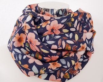 Loop scarf for spring made of muslin in dark blue with flowers