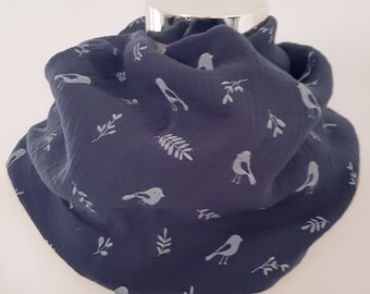 Loop scarf for spring made of muslin in dark blue with a bird motif