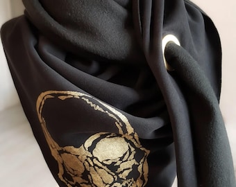 XXL scarf made of winter sweat fabric in black with a golden skull motif