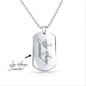 May include: Silver dog tag necklace with a cursive inscription that reads "Love always, Grandma".