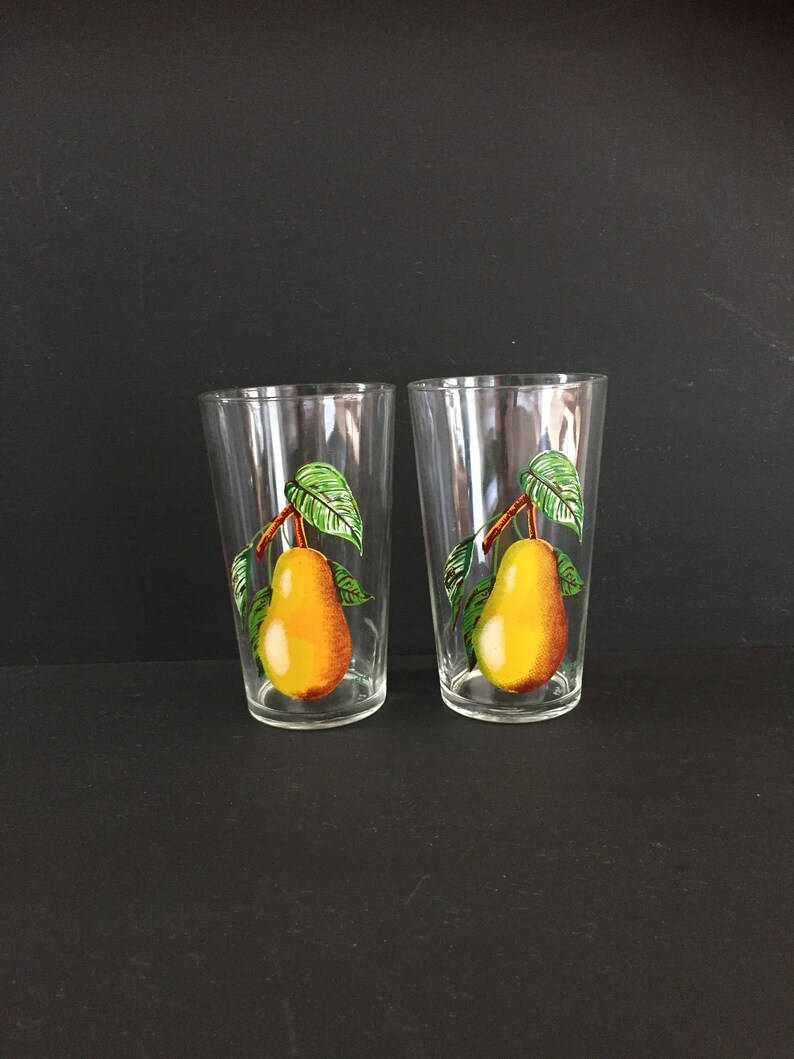 Two vintage 1970s lemonade NEW before store selling glasses peer with decoration.
