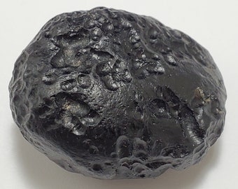 Tektite from Thailand- 48.5 Grams- Thailandite, Indochinite- Semi Flat Oval Palm Stone, Beautiful Pits and Craters- TW8