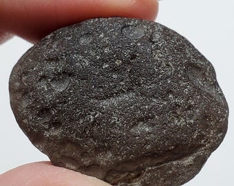 Colombianite from the Cauca River, Colombia- 14.3 Grams- Flat Oval, Weathered, Mineralized- Highly Translucent- E19