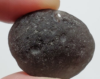Colombianite from the Cauca River, Colombia- 9.2 Grams- Rounded, Semi Weathered, Natural Hole- Translucent- E35