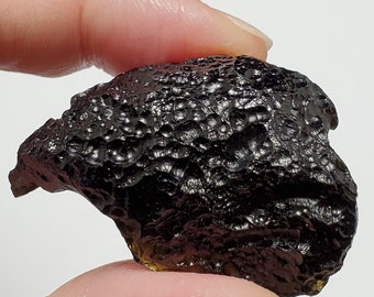 Tektite, from Thailand- 16.5 Grams- Thailandite, Indochinite- Highly Concave Scoop, Wraps Around Finger Slightly- TX21