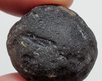Colombianite from the Cauca River, Colombia- 14 Grams- Rounded, Nut or Seed like- Translucent- E7