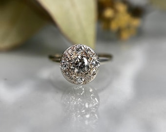 Art Deco style diamond solitaire with halo