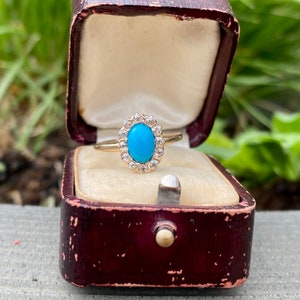 Antique Victorian Circa 1890’s Persian oval turquoise cabochon ring with old miner cut diamond halo in 14k gold