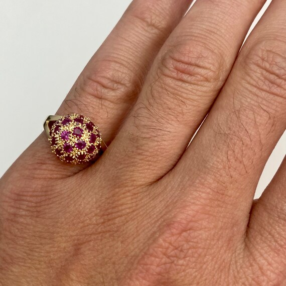 Bague en argent massif sertie d'un petit Rubi - Montres & Bijoux