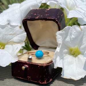 Antique turquoise cabochon solitaire ring in 10k yellow gold