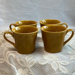 Set of 4 1970s mugs in a golden brown glaze