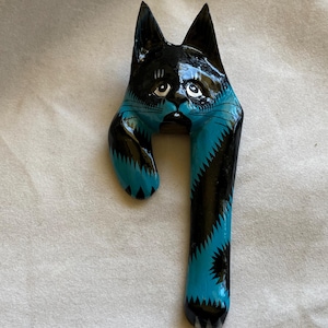 Handmade hanging over your pocket cat brooch