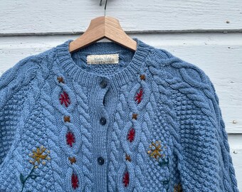 Handknit  blue cabled embroidered sweater