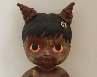 devil baby doll