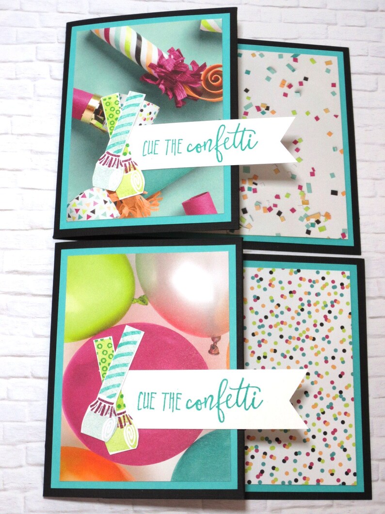 May include: A set of four greeting cards with a party theme. Each card has a black border, a teal inner border, and a white banner with the text "CUE THE confetti". The cards feature images of party horns, balloons, and confetti.