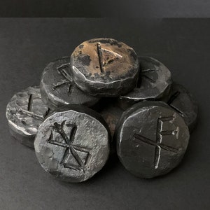 Forged steel worry stones with viking runes