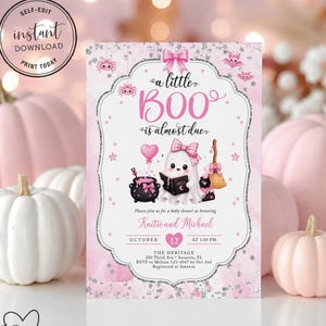 May include: A rectangular baby shower invitation card featuring a pink and white theme with a ghost illustration, a cauldron, a broom, and the text 'a little BOO is almost due'. The design includes silver glitter accents, pink bows, and stars.