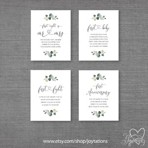 May include: Four printable cards with a green leafy design and text that reads "first night as mr & mrs", "first baby", "first fight", and "first anniversary".