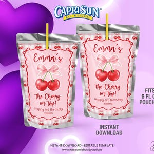 May include: Two Capri Sun pouches with cherry-themed designs. Each pouch features the text "Emma's," "The Cherry on Top!" and "Happy 1st Birthday Emma." The pouches are pink with red accents and a bow graphic. The pouches fit 6 fl oz.