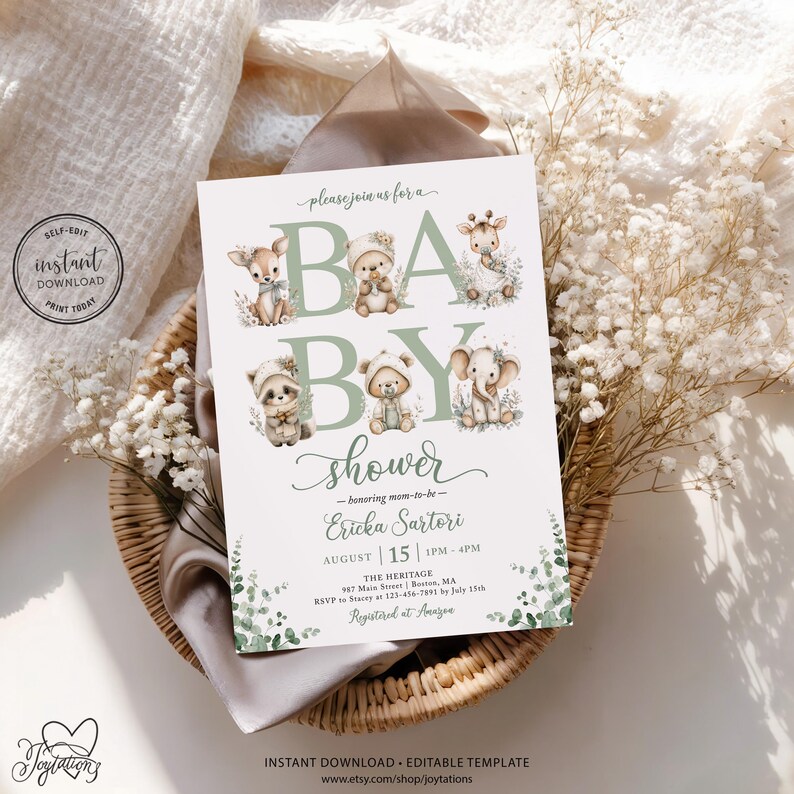 May include: A white baby shower invitation card featuring watercolor illustrations of a deer, bear, giraffe, raccoon, and elephant. The text reads: please join us for a BABY shower honoring mom-to-be Ericka Sartori, August 15, 1pm-4pm, The Heritage.