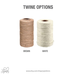 May include: Two spools of twine, one brown and one white, with the text "TWINE OPTIONS" above them and the words "BROWN" and "WHITE" below them.