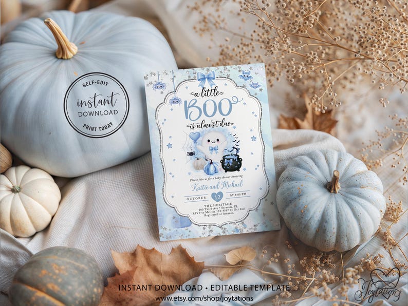 May include: A rectangular baby shower invitation card featuring a light blue and white watercolor background with a central ghost illustration, a black cauldron, and the text "a little BOO is almost due" in blue script and serif fonts.