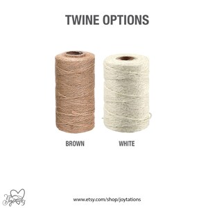 May include: Two spools of twine, one brown and one white, with the text "TWINE OPTIONS" above them and the words "BROWN" and "WHITE" below them.