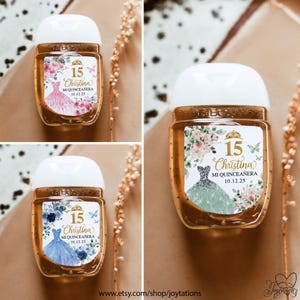 May include: Three small, clear hand sanitizer bottles with white tops. Each bottle has a decorative label featuring a quincea&ntilde;era dress, the number 15, the name "Christina", and the date 10.12.25. Floral and butterfly accents complete the design.