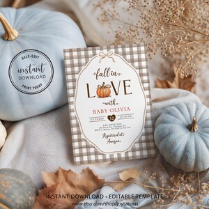 May include: A rectangular baby shower invitation card with a brown and white buffalo check border. The text reads fall in love with BABY OLIVIA, October 12, and includes event details. A small orange pumpkin illustration replaces the letter O.