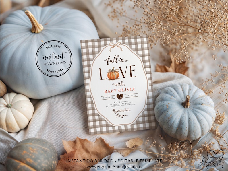 May include: A rectangular baby shower invitation card with a brown and white buffalo check border. The text reads fall in love with BABY OLIVIA, October 12, and includes event details. A small orange pumpkin illustration replaces the letter O.