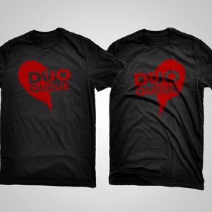 May include: Two black t-shirts with a red heart design and the text "DUO QUEUE" on each shirt.