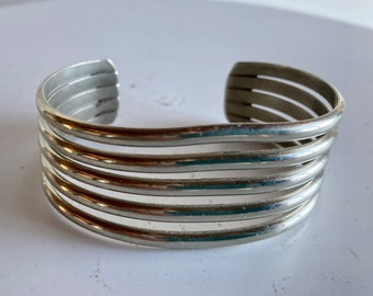 Silver Bracelet has Five Bands Smooth and Elegant