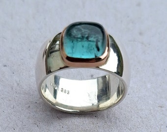 Bague en argent avec monture en or et tourmaline