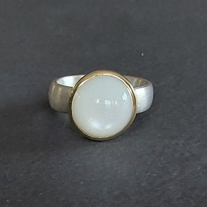 Noble moonstone ring with gold setting