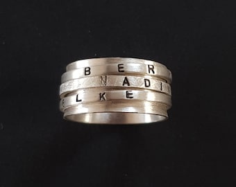 Rotating bezel Spinner ring family ring