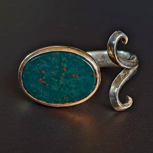 Exceptional ring with heliotrope
