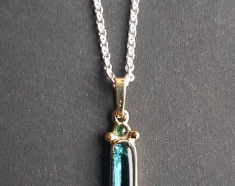 585 pendentifs en or avec tourmalines