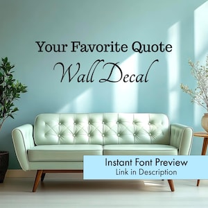 May include: A light green tufted sofa with wooden legs sits in front of a light blue wall. The wall features the text "Your Favorite Quote Wall Decal" in black script. A light blue banner at the bottom reads "Instant Font Preview Link in Description."