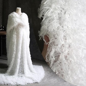 Tassel feather puffer autumn and winter fringe Woollen Polyester fabric White  / light gray