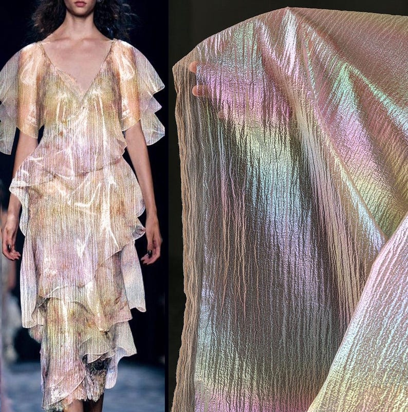 May include: A shimmering, iridescent fabric and a layered dress. The fabric has a textured appearance with a rainbow sheen. The dress features a V-neckline and layered ruffles, creating a flowing silhouette. The colors include pastel shades of pink, yellow, and green.