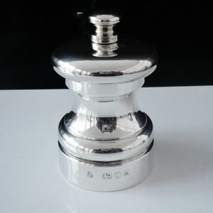 antique silver pepper grinder