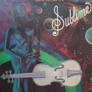 May include: A vinyl record cover with a colorful, abstract design featuring a woman, a violin, and planets. The title of the album is "Simplemente Sublime".