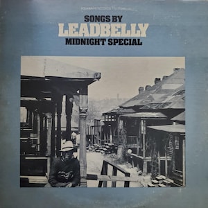 May include: A rustic wooden sign with the text "Welcome to our home" in white lettering. The sign features a distressed finish and a simple, inviting design, perfect for a front porch or entryway.