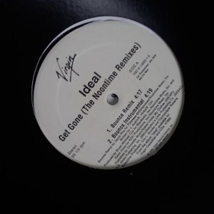 Amazon.com: In Time (10th Anniversary Deluxe) [Electric Blue